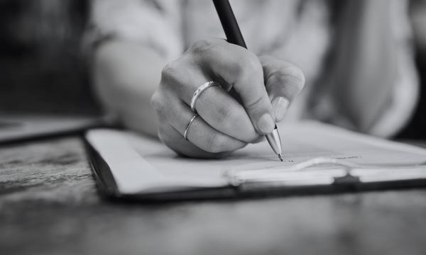 person filling in form