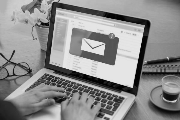 person typing on laptop